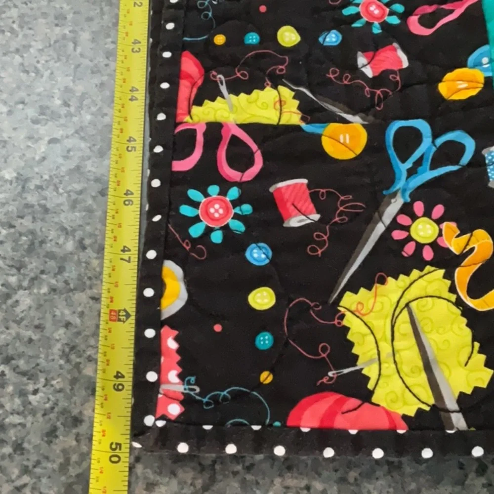Quilted Happiness fabric wall hanging for people who sew.